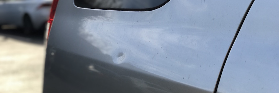 A small cosmetic dent on a 2006 Honda CRV EX. This dent can be removed with paintless dent repair, or pdr.