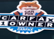 A Carfax History Report logo on a car.