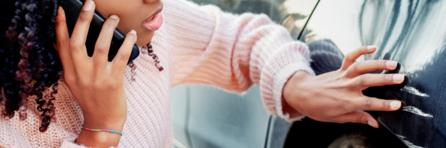 Lady bothered by scratch on car