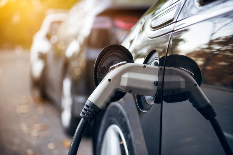 Electronic vehicle charging in public charging station.